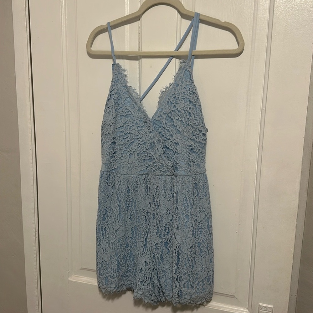 Very cute blue romper- only worn once! Size large